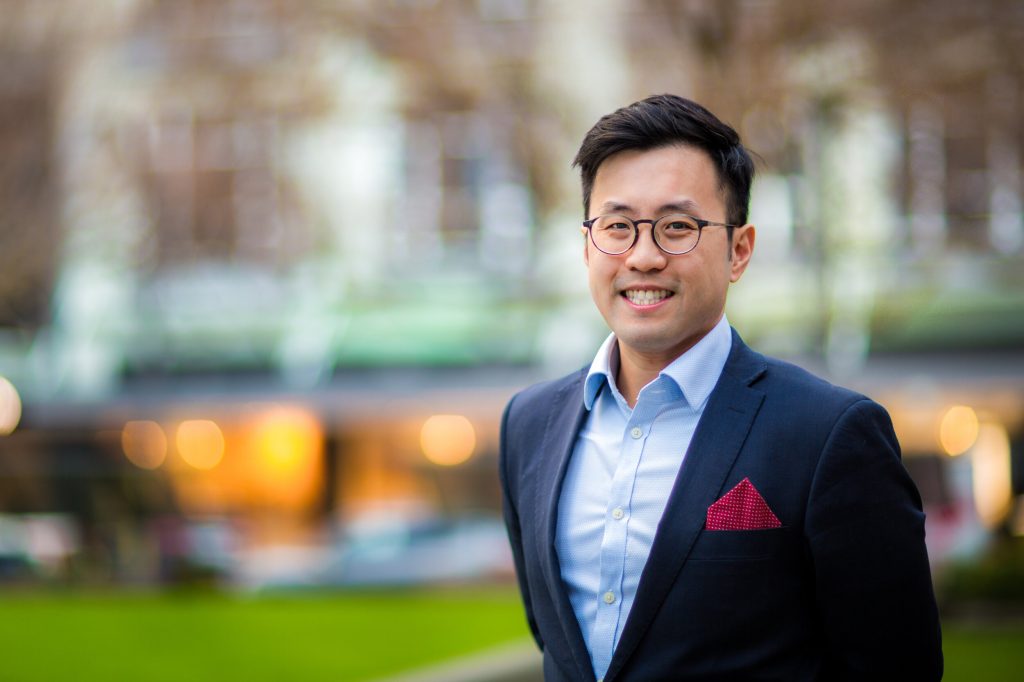 Dr. Leong Smiling in a suit